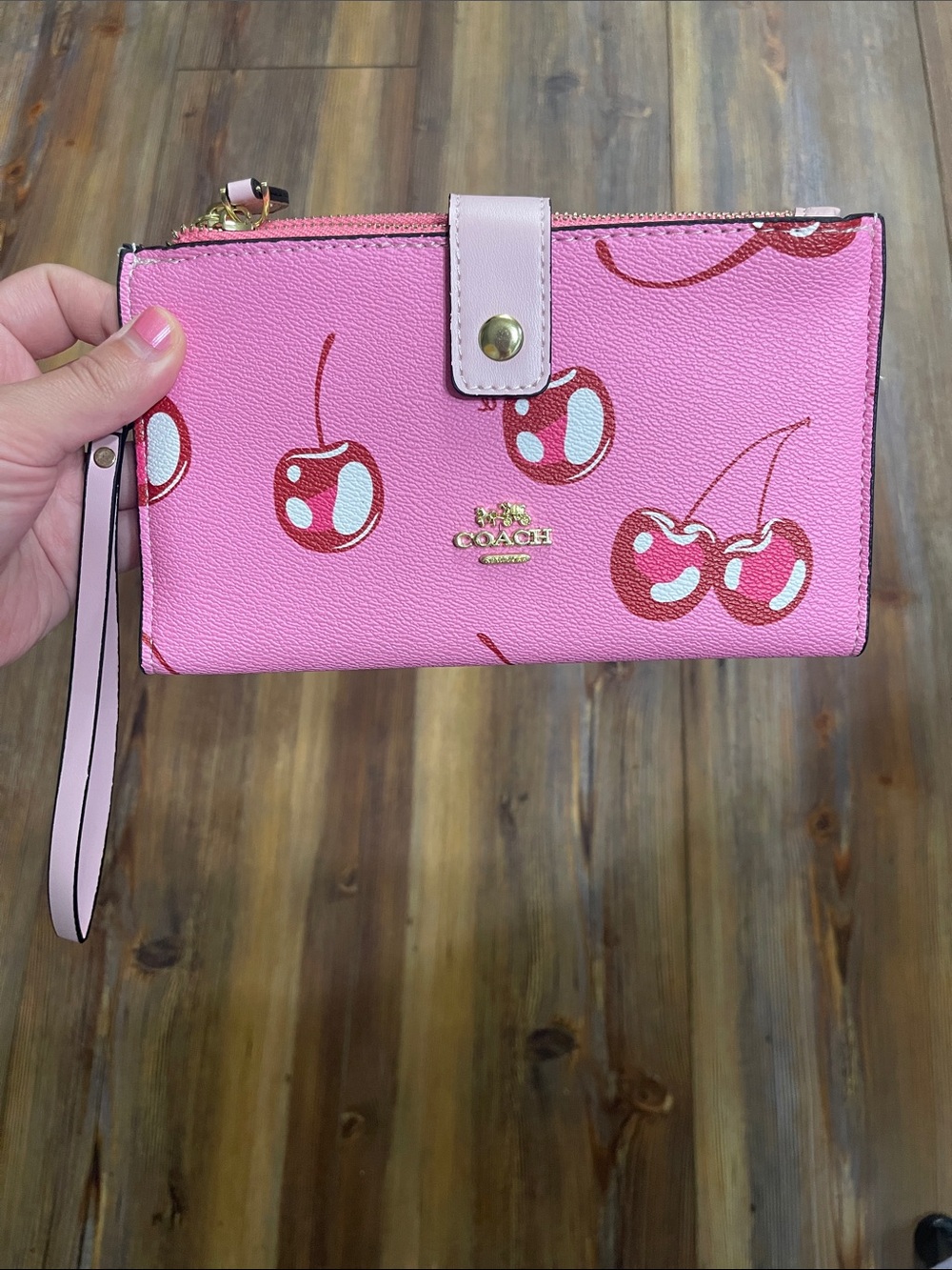 Pink cherry Coach wristlet wallet